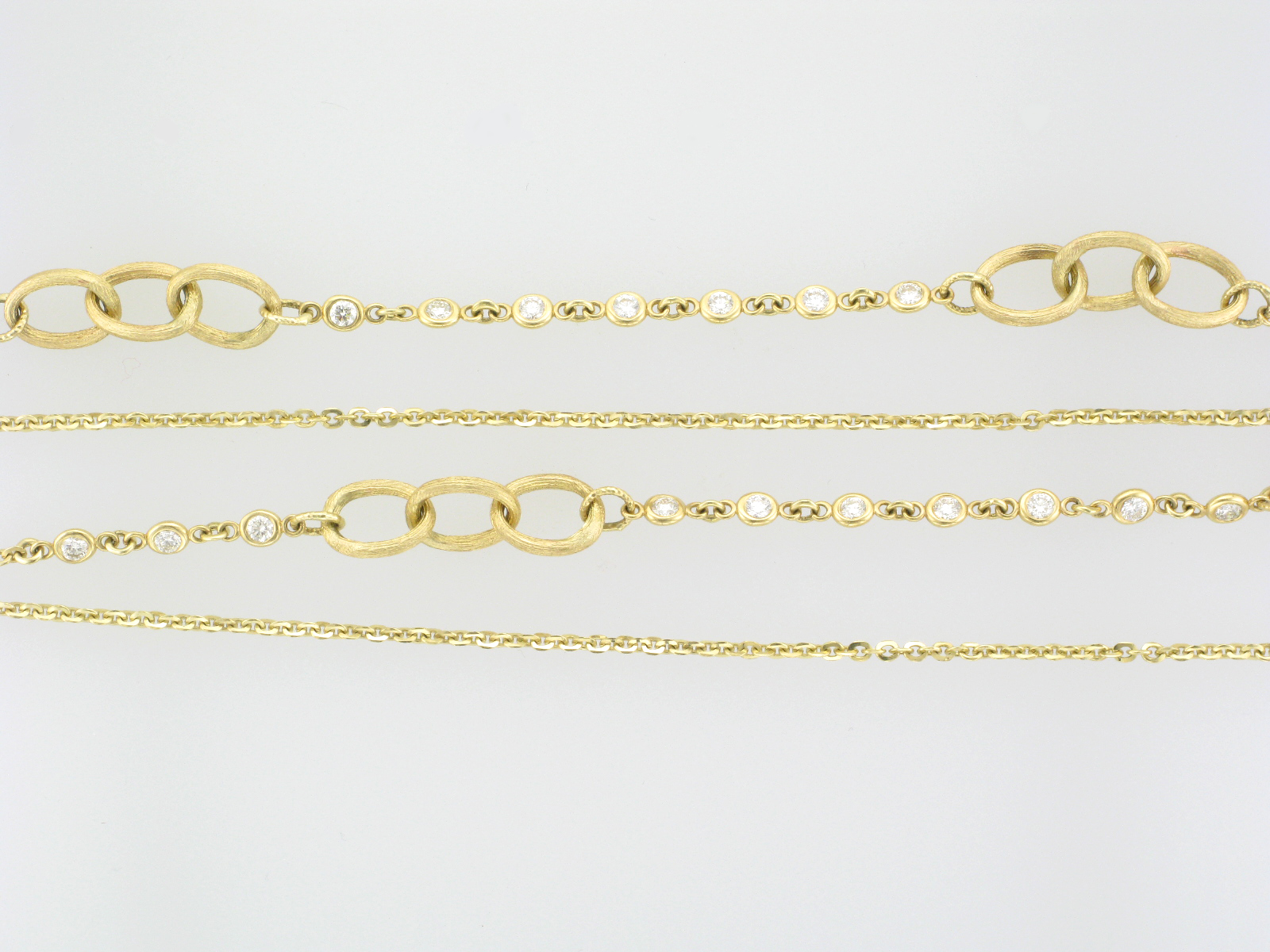 Long Yellow Gold and Diamond Loop Necklace
